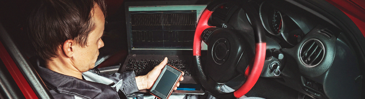 Mechanic diagnosing a vehicle using the latest equipment - Car Diagnostics Heanor